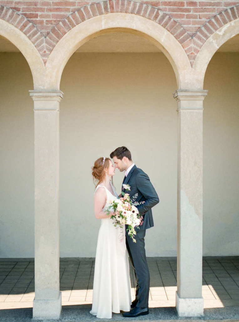 Intimate moment between bride and groom