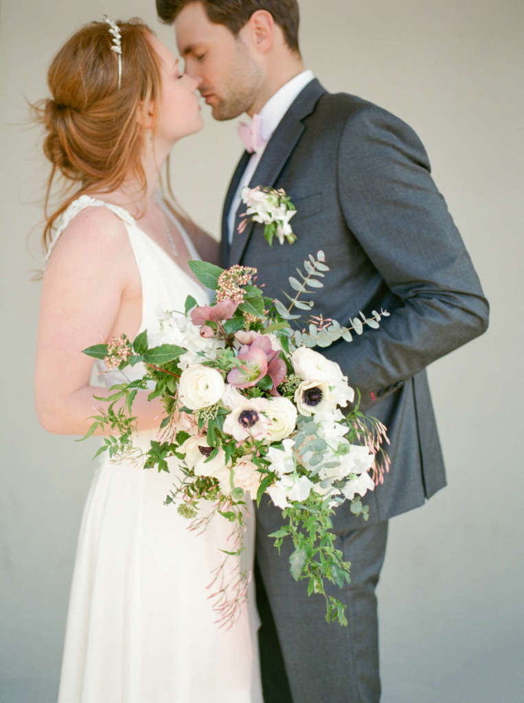 kiss of bride and groom in geneva