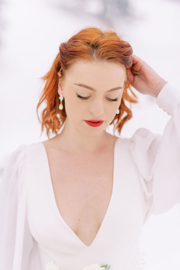 Snow bride, bride with her bouquet, winter wedding, winter wedding dress